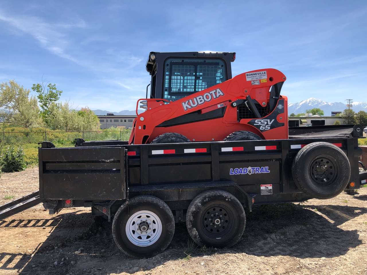 Bobcat and dump trailer combo for rent. Perfect landscape package. Easy to use skid steer