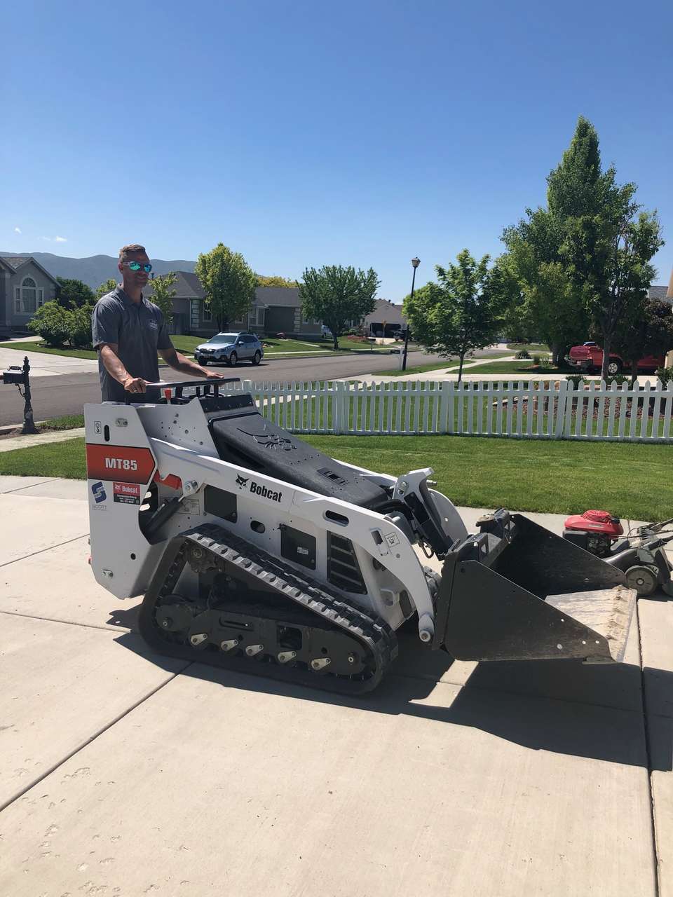 Mini Bobcat skid steer for rent. Only 36 inches wide, lifts 850 lbs! SAVE $$