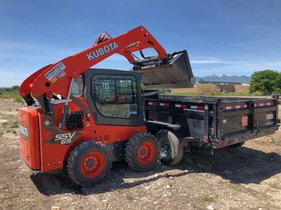 Kubota SSV65 Skid Steer + Dump Trailer Combo for Rent! nice bobcat combo