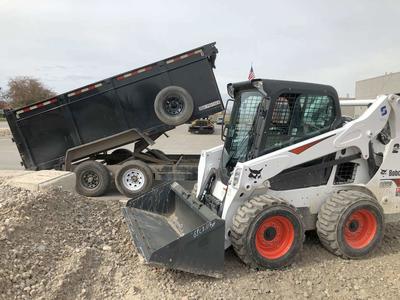Bobcat rental with dump trailer. Nice skid steer and 14k dump trailer combo