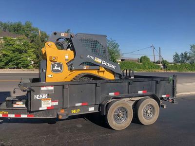 Deere Track Skid Steer and Dump Trailer combo for rent!