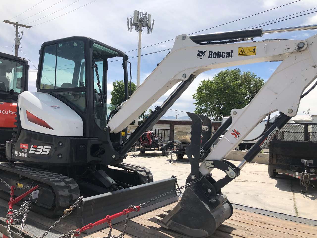 Bobcat E-35 mini excavator and dump trailer combo deal. Nice tractor!