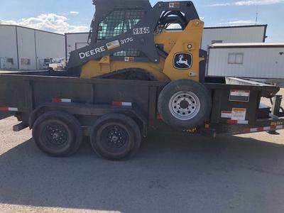 John Deere Track Skid steer and large 7x14 dump trailer combo