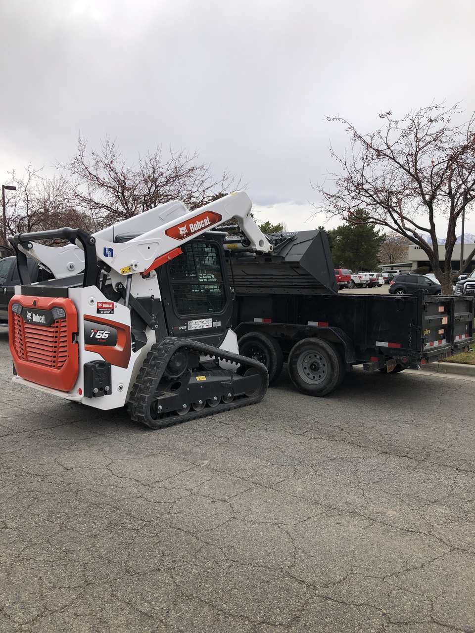 Bobcat track skid steer and large 7x14 dump trailer combo!