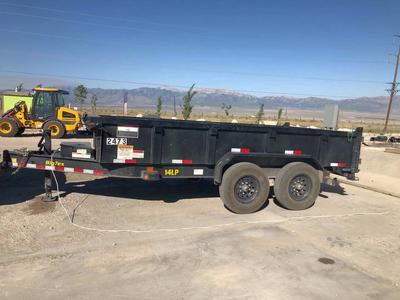 Large 7x14 Dump trailer for rent. Holds up to 14 yards! 14k