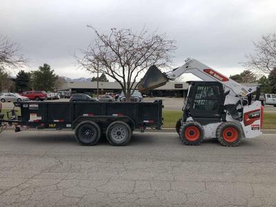 Bobcat skid steer and dump trailer combo. Perfect package for your job
