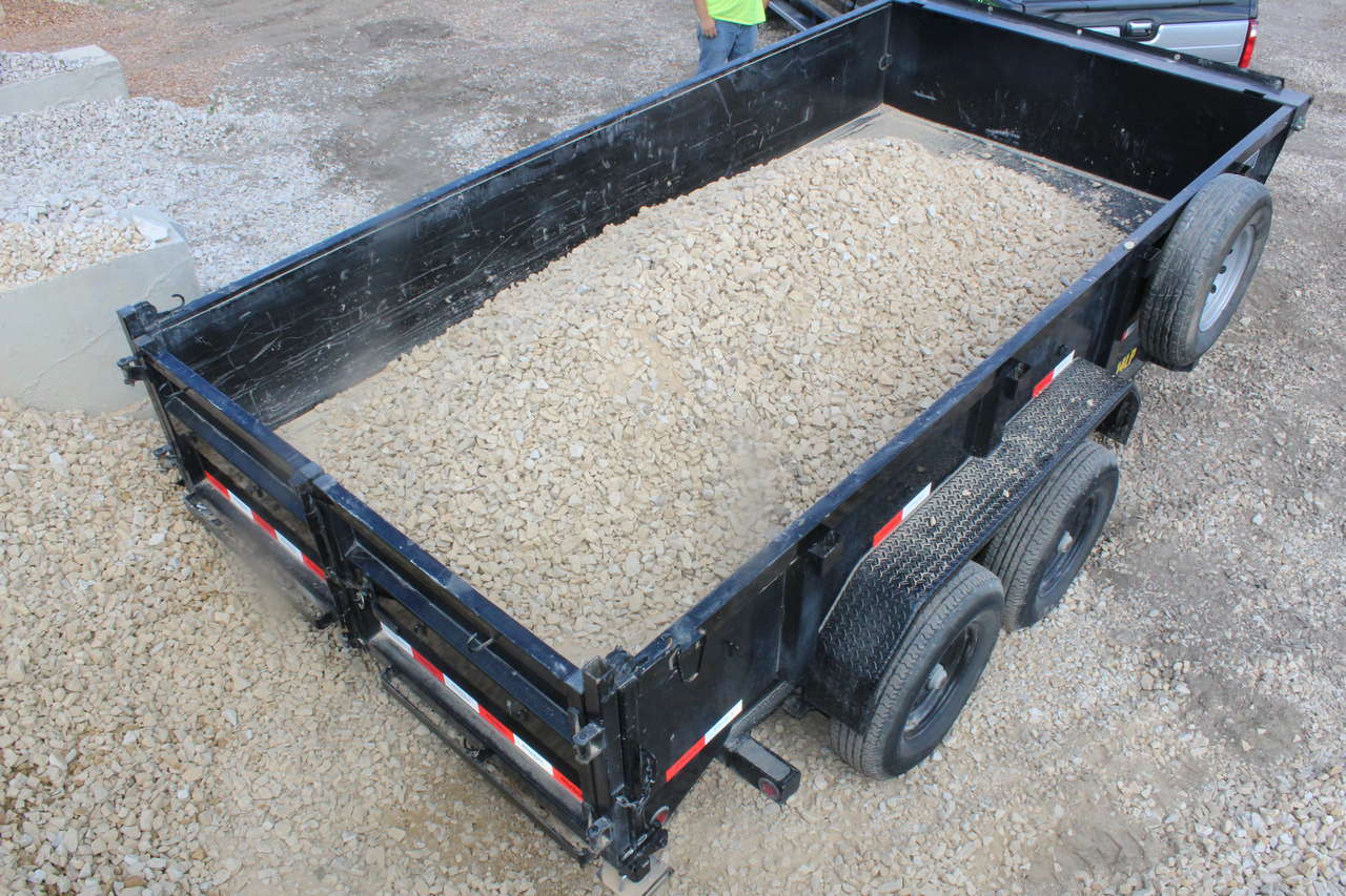Large 7x14 Dump Trailer for rent. Has hydraulic lift and holds up to 10k lbs