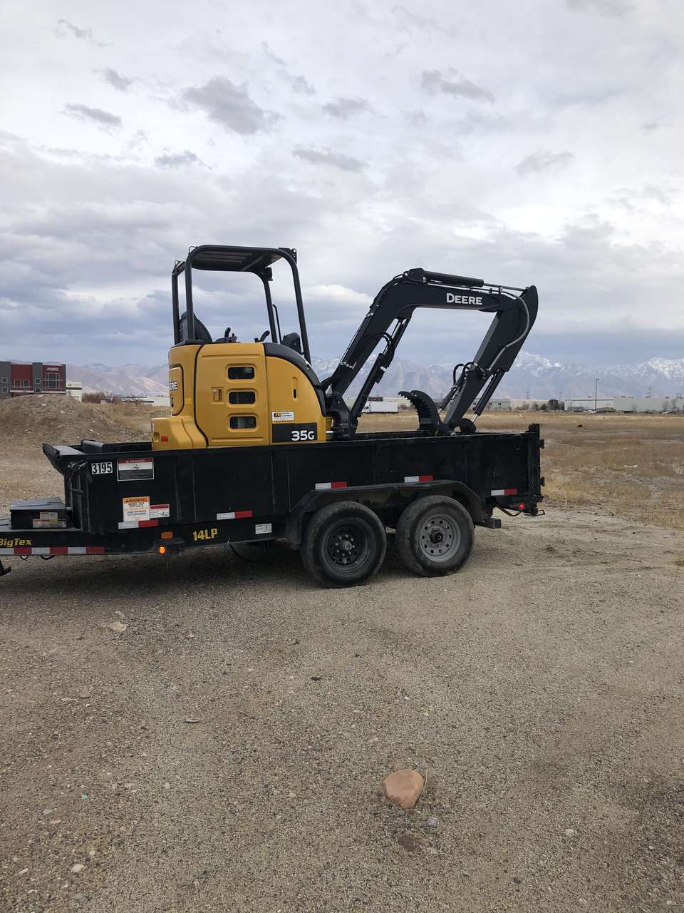 John Deere 35G mini excavator and dump trailer combo for rent. Perfect landscape package deal!