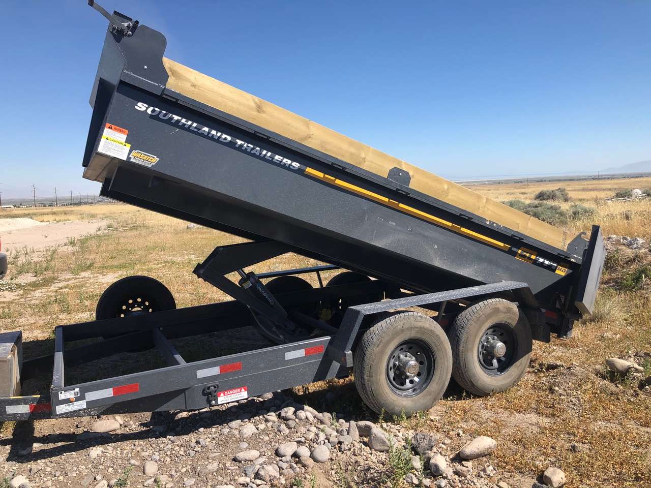 Large dump trailer for rent. 7x14 with 14k axels. Dirt, concrete, ok!