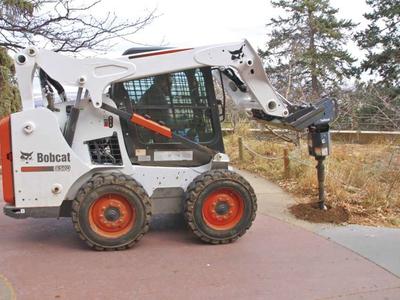 Bobcat with attachments for rent. Skid steer with forks, grapple, auger, breaker, rock bucket, sweeper, tooth bucket!