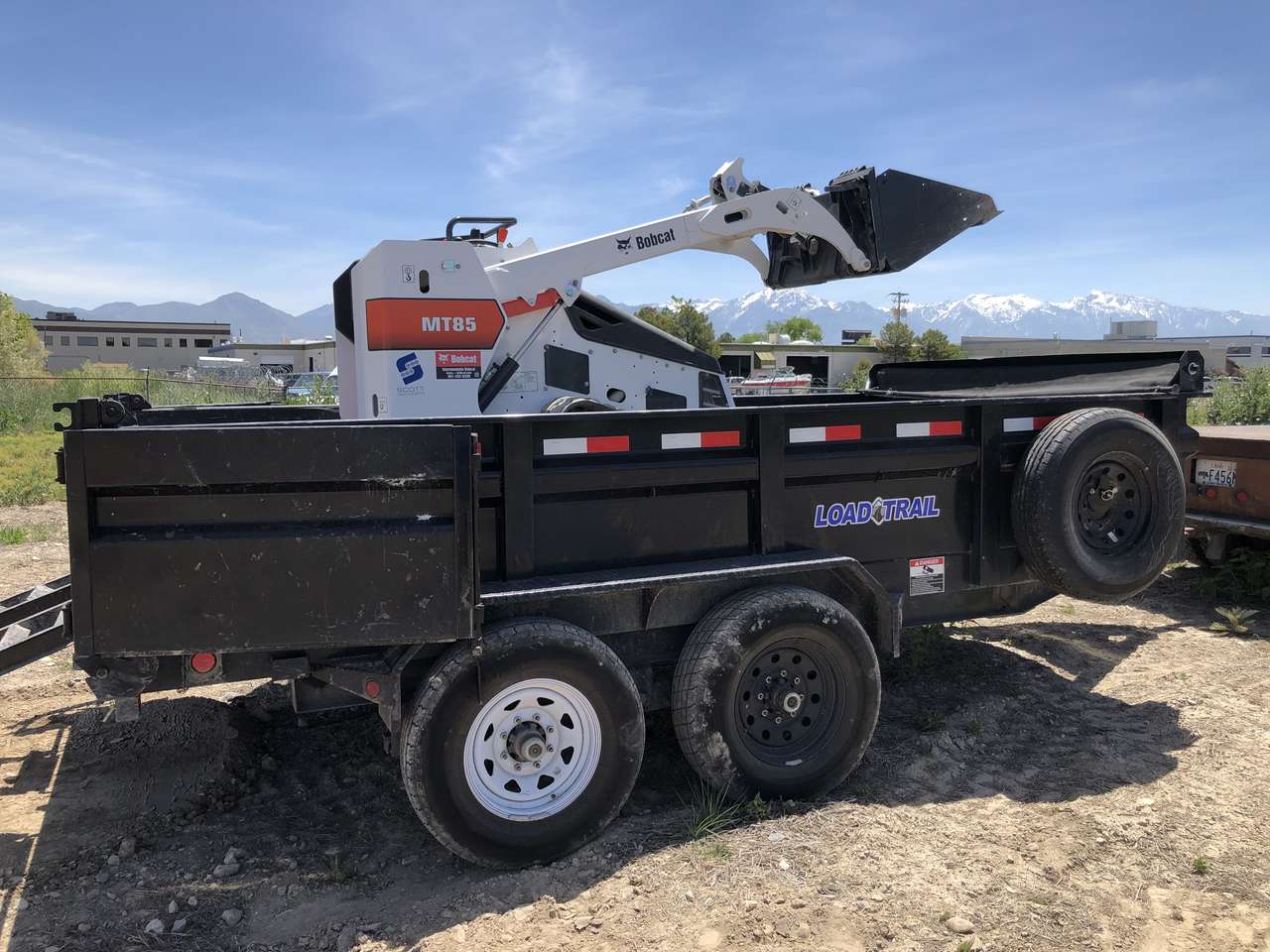 Dingo and Dump trailer combo for rent - Great for tight spaces (only 40 ins wide)