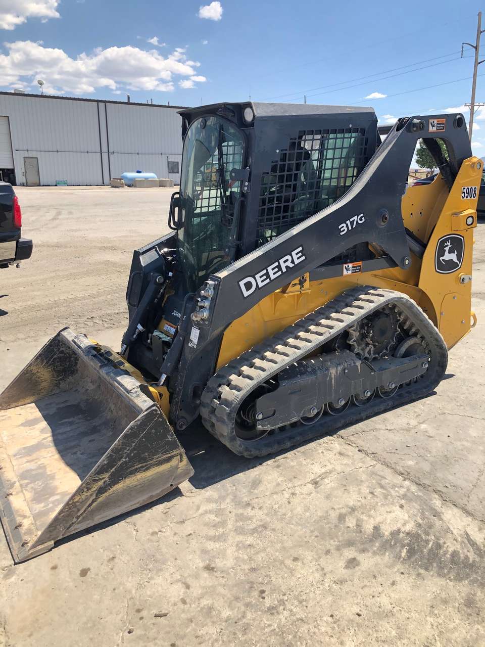 Track skid steer loader for rent. Nice 2021 Deere 317G with hand controls and cab