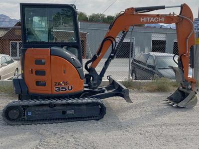 8,000 lb mini excavator with thumb and 24 in bucket. Nice 2020 Hitachi 35U