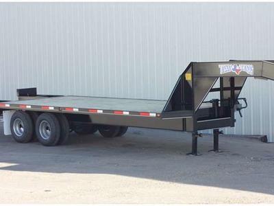 New 32' dually gooseneck flatbed trailer for RENT. 24k rating with dove tail ramps