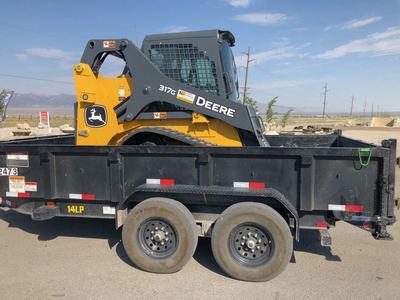 Track skid steer and 7x14 dump trailer combo RENTAL. Track skid loads right into dump trailer
