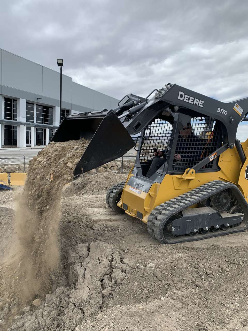 Deere track skid steer for rent - great versatility for any size job