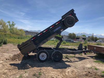 Dump trailer for rent. 7x14 size with 10,000lbs load capacity - also have machines