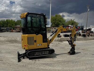 2024 Cat 302 Mini Excavator. Fits through 40 inch gates.