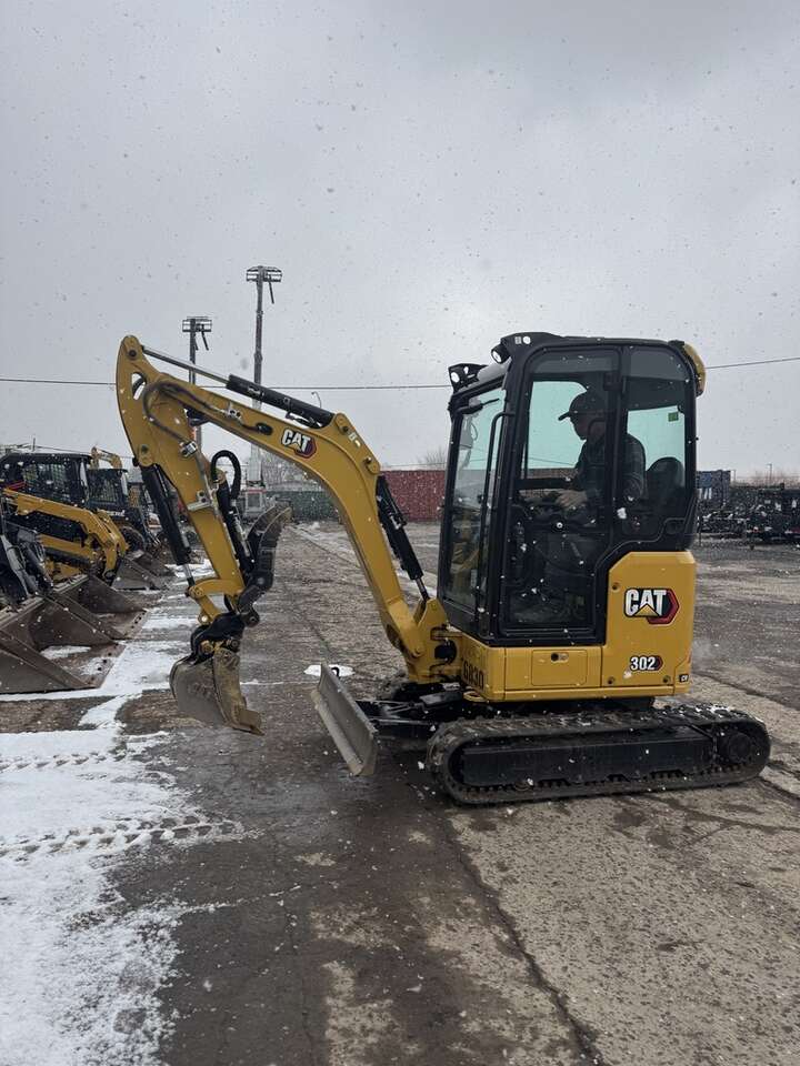 Small mini excavator for rent. Fits through 40 inch gates, digs 7.5 feet, has thumb!