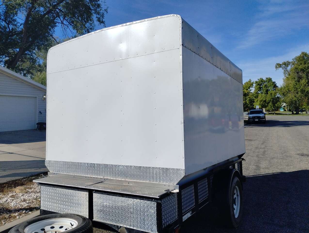 trade or barter  utv trailer made in to enclosed trailer  11 ft long  w/ ramp  box is 8 ft