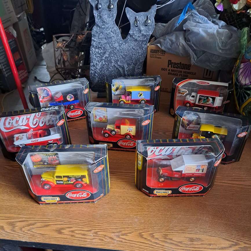 8 Coke matchbox cars