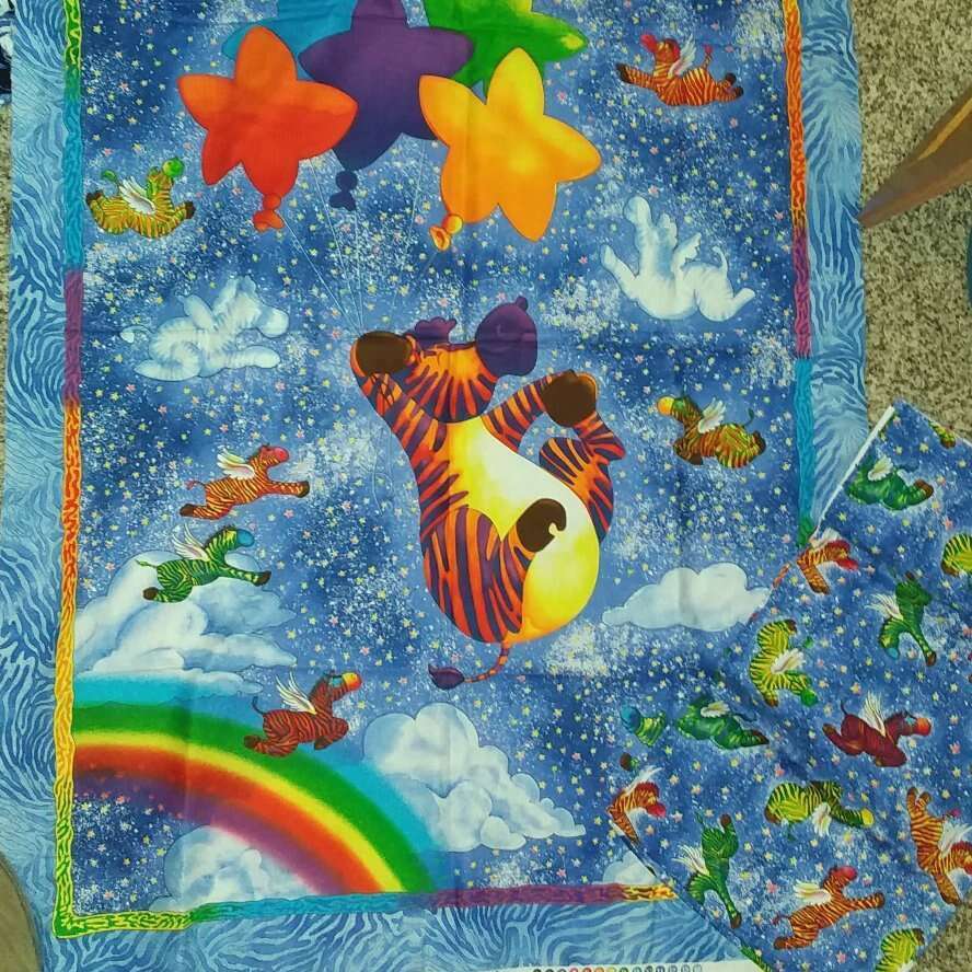 ZEBRA OF A DIFERENT COLOR QUILT..FRONT AND BACK