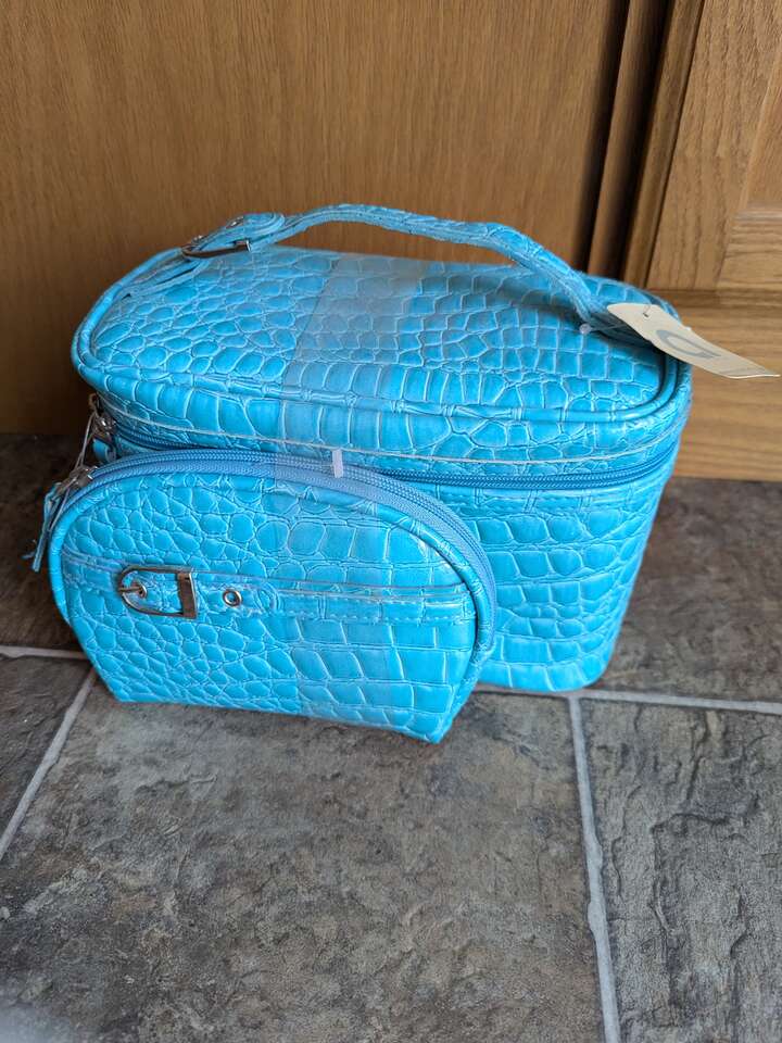 Cosmetics/Jewelry bag plus personal pocket purse