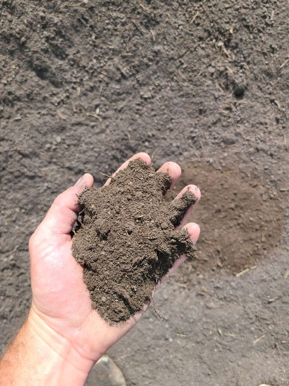 Top soil, gravel, boulders