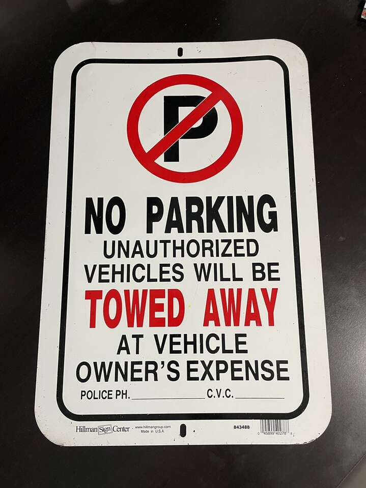 No Parking Tow Away Sign