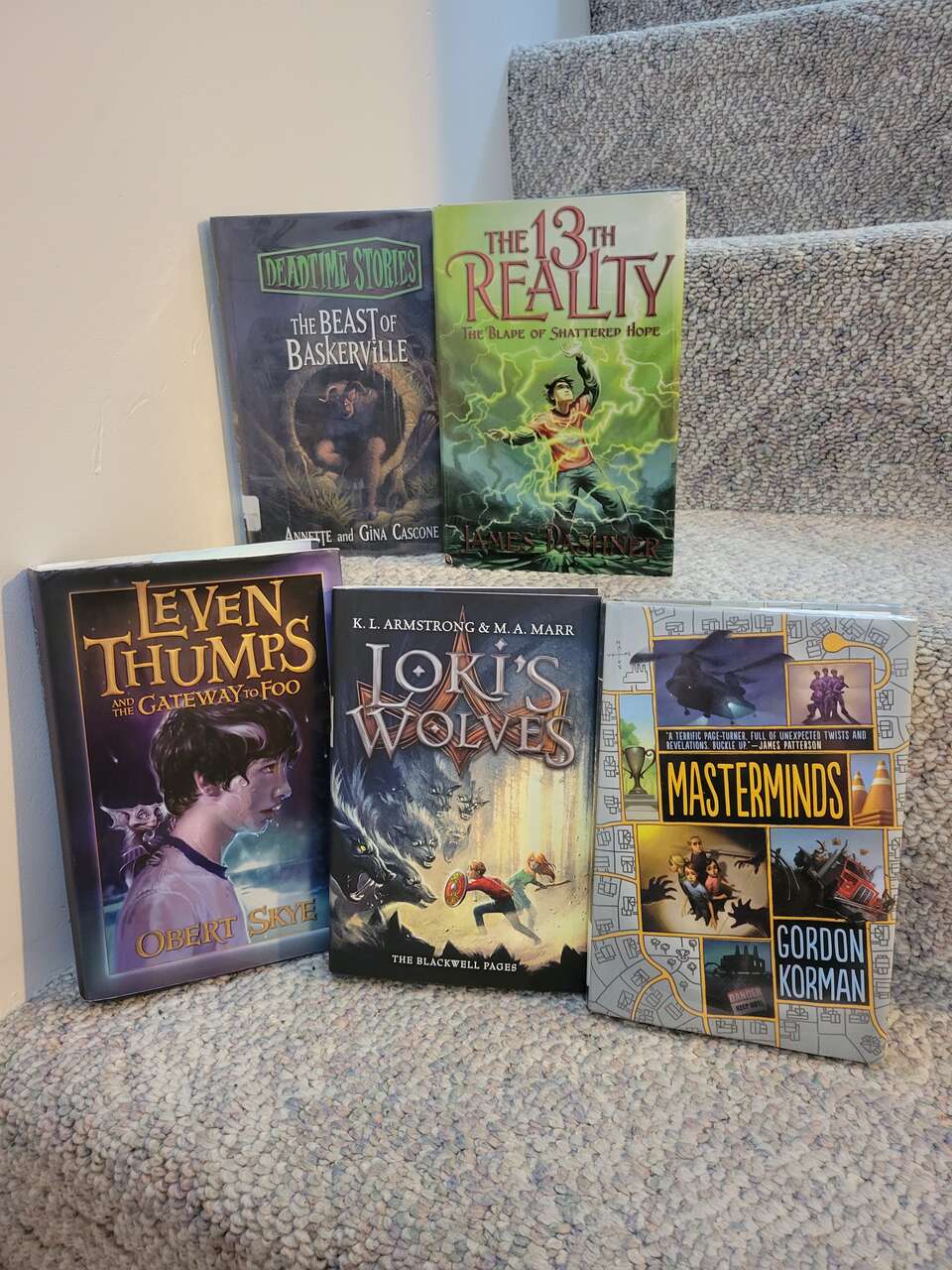 Leven Thumbs, Loki's Wolves, Masterminds, Dead man stories, the 13 Reality hardback paper sleeve cover books