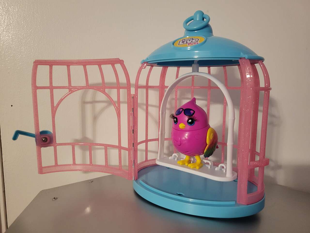 Little Live Pets Lil' Bird Pippy Hippy, with cage
