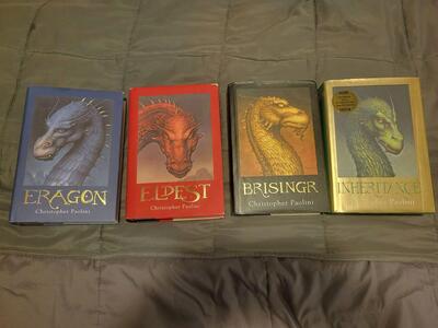 Inheritance Cycle 4 Book Set: Eragon, Eldest, Brisingr, Inheritance by Christopher Paolini Hardback with paper covers