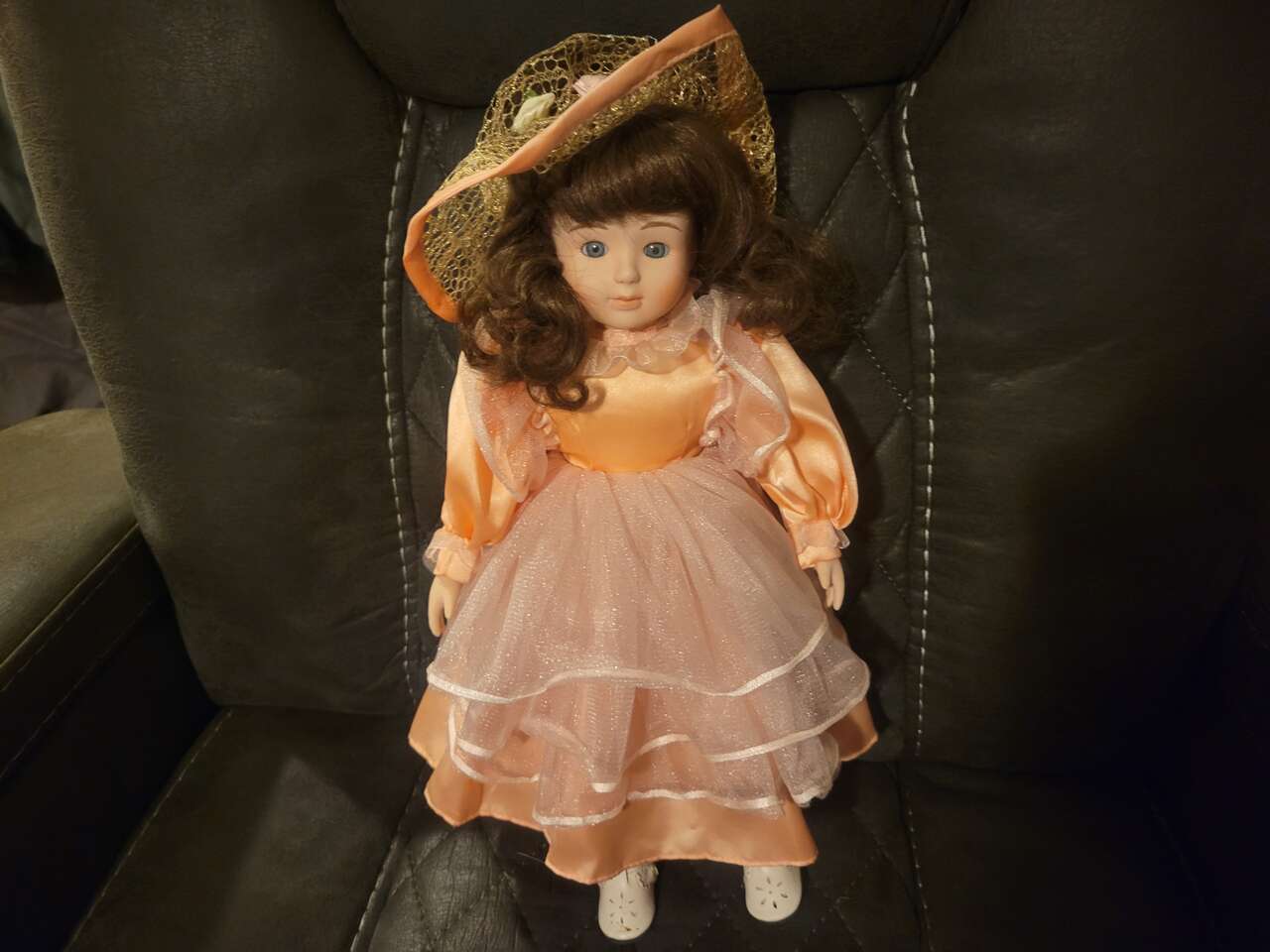 Vintage Porcelain China Doll Brunette with peach color Dress, Hat, and Shoes