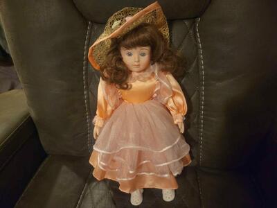 Vintage Porcelain China Doll Brunette with peach color Dress, Hat, and Shoes