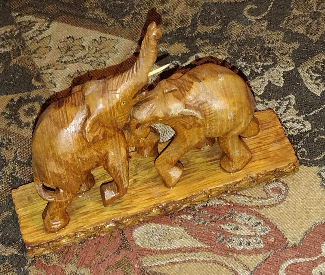 Hand carved elephants solid teak wood