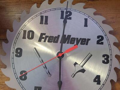Vintage Fred Meyer Saw Clock