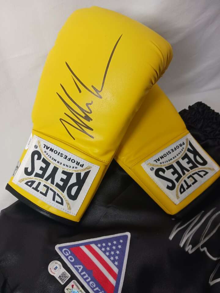 Mike Tyson autographed shorts and gloves $ is OBO.