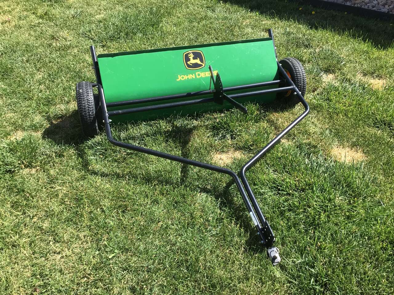 John Deere grass sweeper