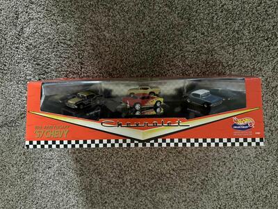 Hot Wheels 1997- 40th Anniversary '57 Chevy Four Car Set Reflecting 1957 to 1997.