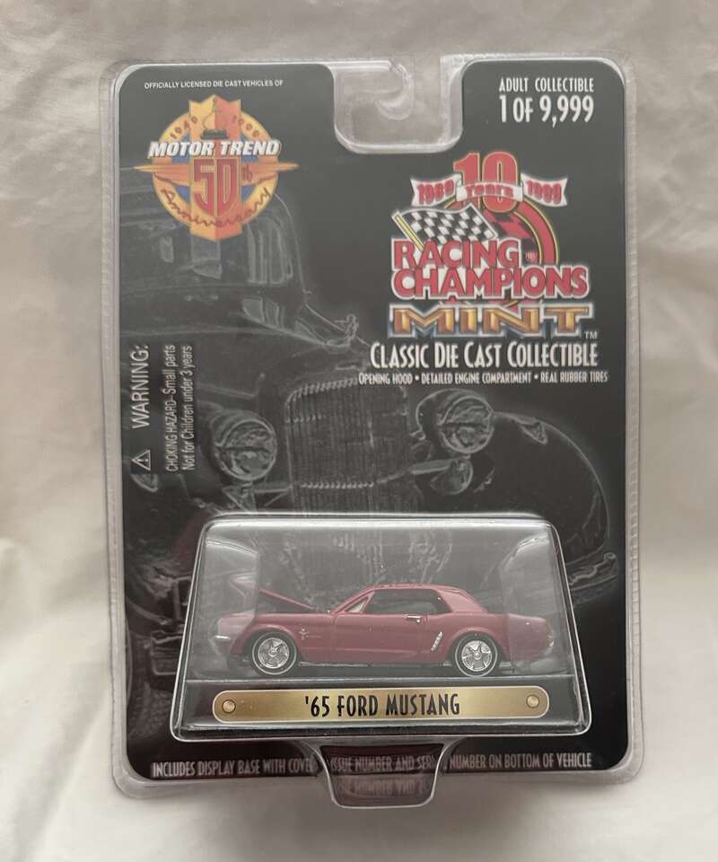 Racing Champions 1999 Mint Presents the 1965 Burgundy Mustang 3.25 Inch Scale Die Cast Vehicle.