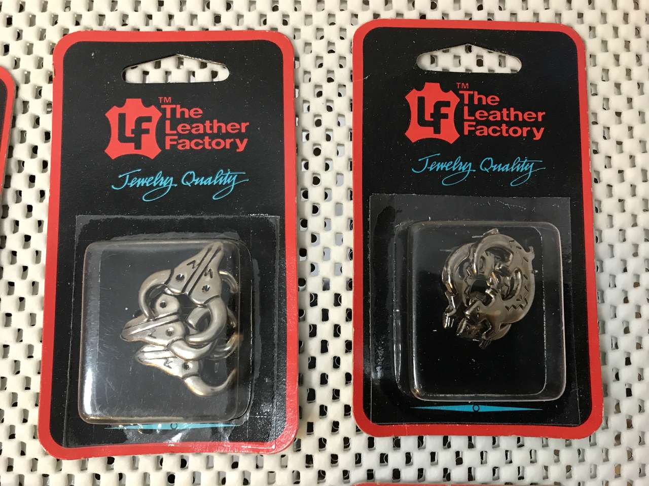 The Leather Factory Lot of 7 Pkgs. - Brads, Conchos andBolo Tie Cord, NIP