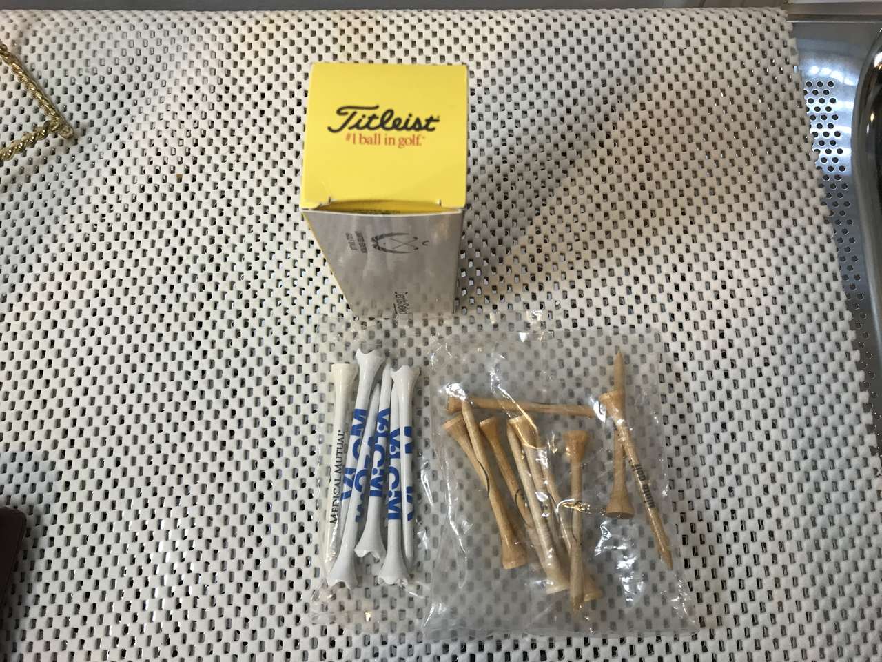 Titleist Golf Balls and Golf Tees, or Golf Ball Back Massager Metal/Golf Balls