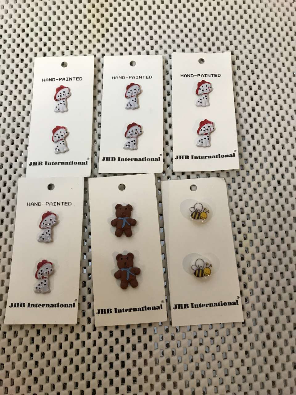 Buttons Hand Painted Le Bouton, La Mode, JHB Int. and La petite Buttons, Navy Blue with a design in center $5 for any 3