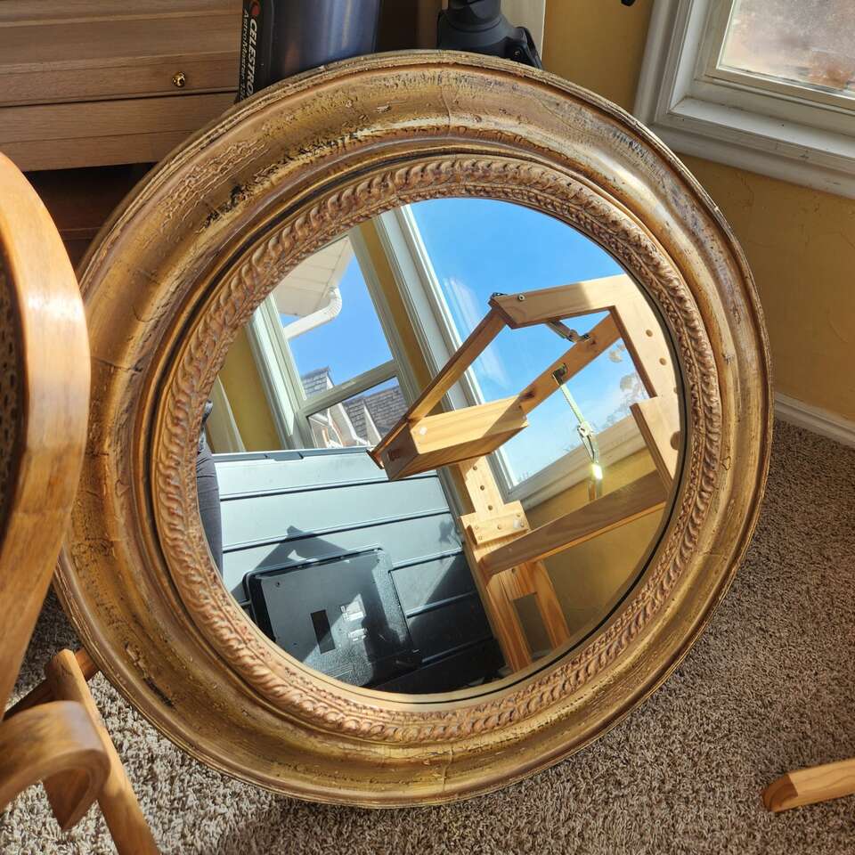 round gold mirror