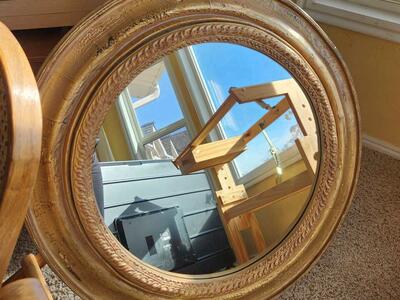 round gold mirror
