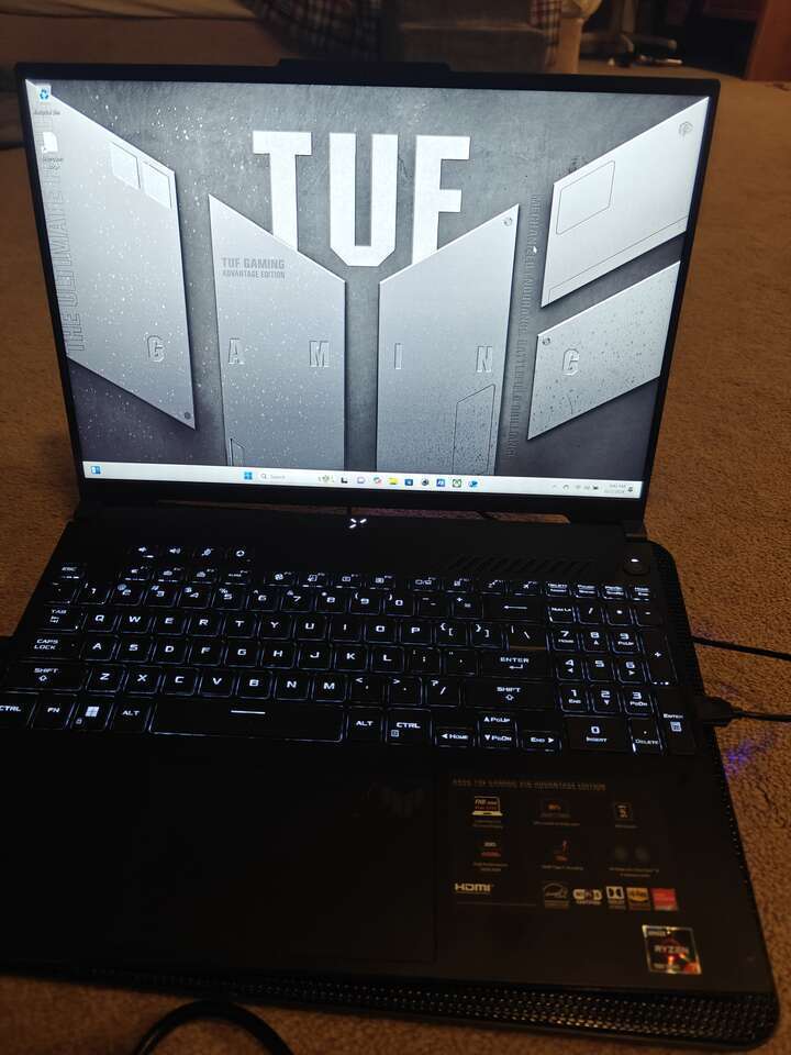 Asus TUF A16 Advantage edition with rgb cooling pad (late 2023). 16" 165hz 32gb DDR5 Ram 1.5 tb storage. Rx7600s