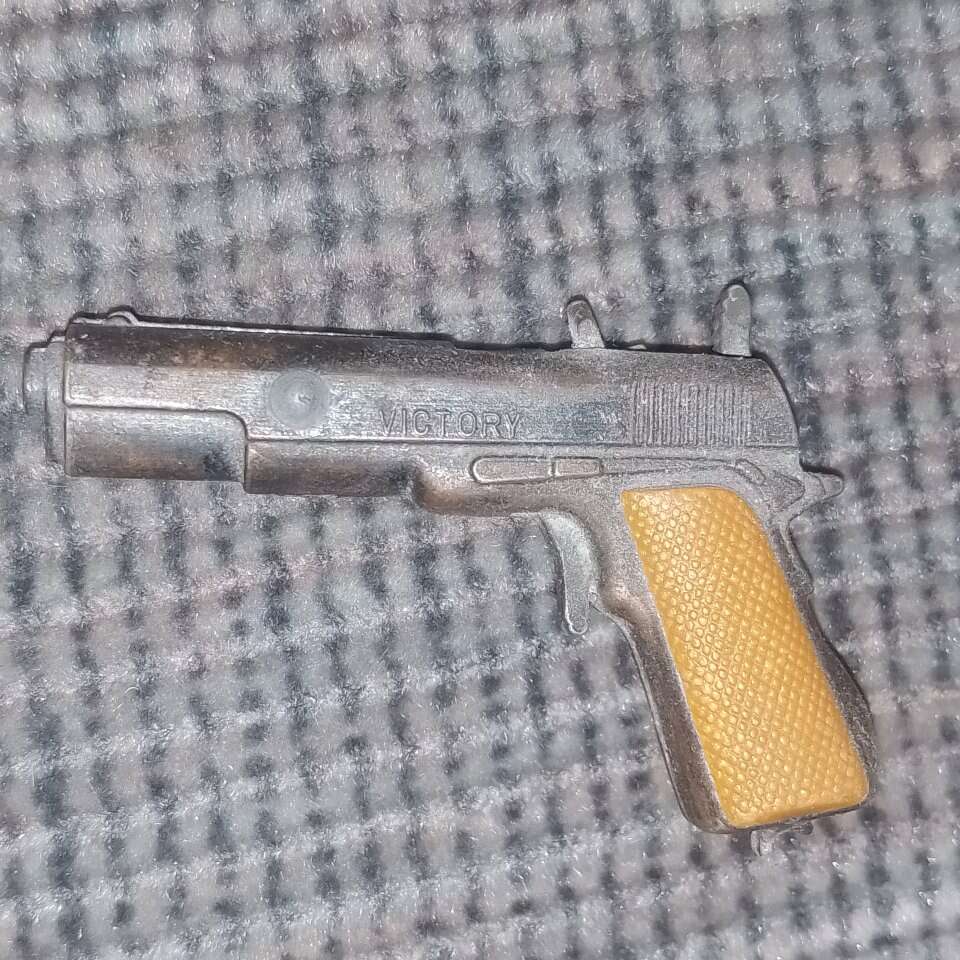 Miniature cap gun