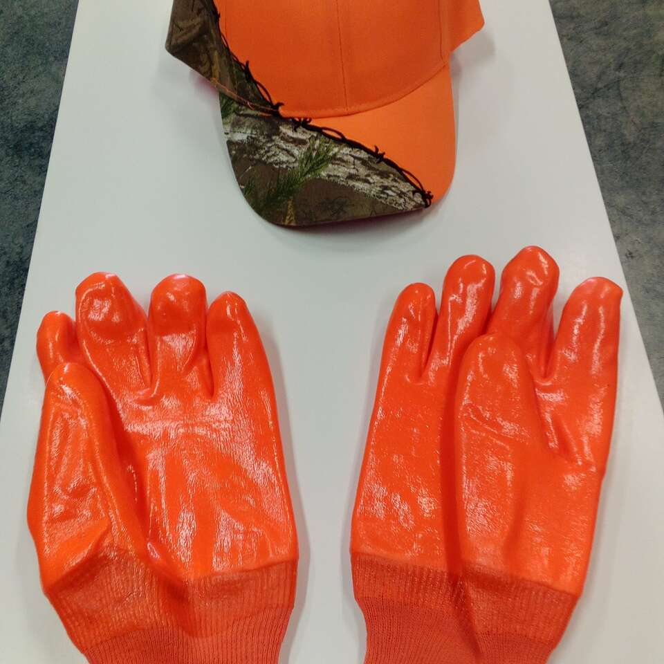 Waterproof rubberized gloves and hat