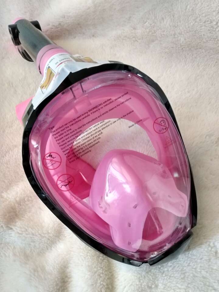 Pink snorkel with full face mask. Water Sports
