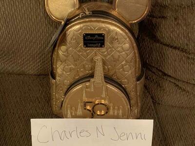 Gold 50th Anniversary Loungefly Mini Backpack.